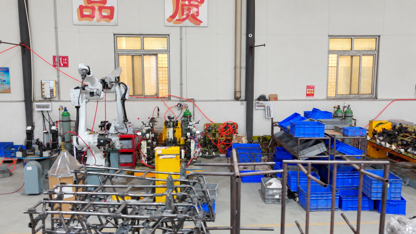 Frame fabrication and robotic welding station