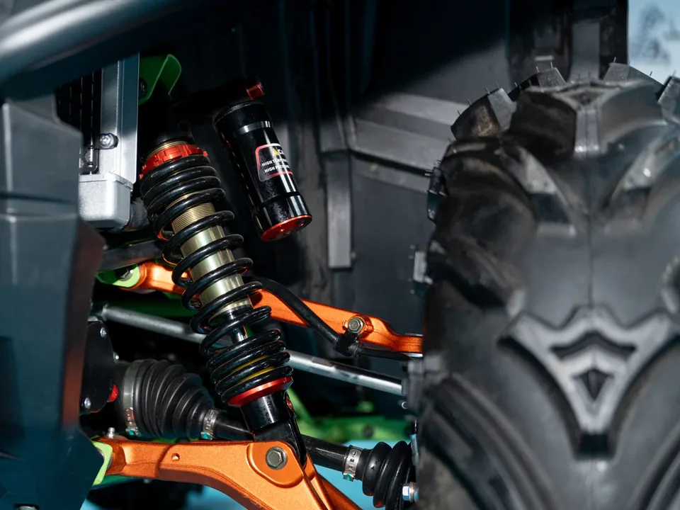 S700 front suspension with aluminium alloy A-arms and a piggyback shock absorber